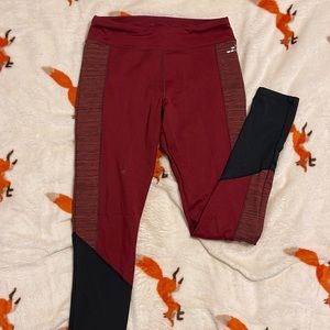 I am selling a pair of maroon and black leggings size medium, bran is BCG.